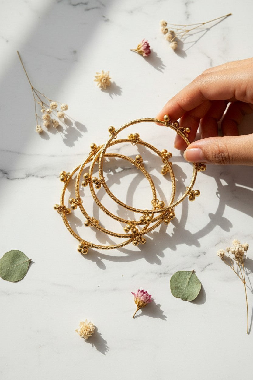 Traditional Gold Textured Ghungroo Bangle Set